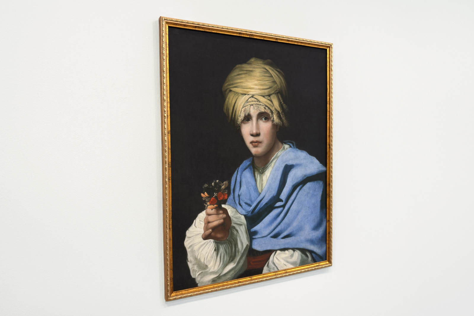 Menino em um turbante segurando um Nosegay - Michiel Sweerts