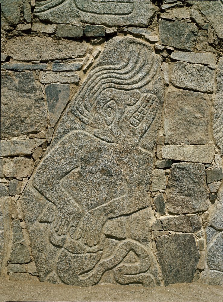 Muro com alívio de um guerreiro de Pre-Columbian Pre-Columbian