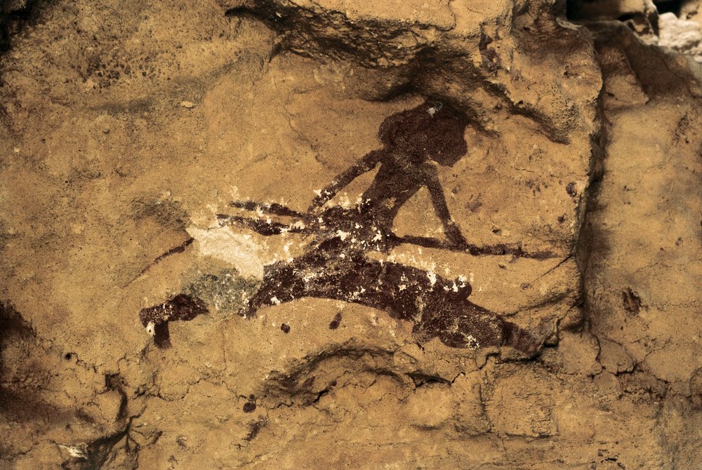 Arte rupestre: caçadora de mulheres. Pré-história, Paleolítico Superior. Caverna Tio Garroso, Espanha. de Prehistoric Prehistoric