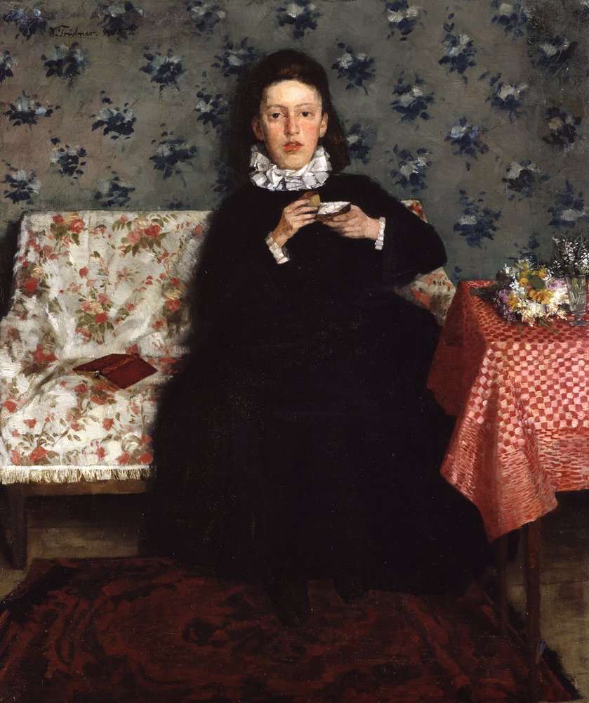 No sofá de Wilhelm Trübner