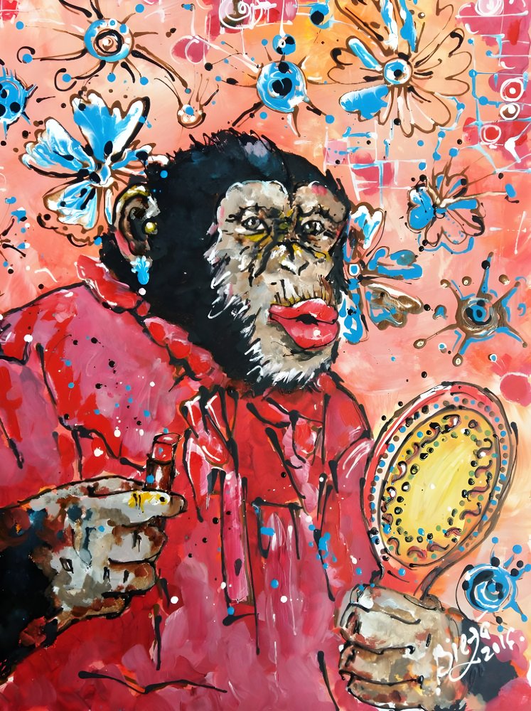 Chimpanzé a aplicar batom de Anda Bieza