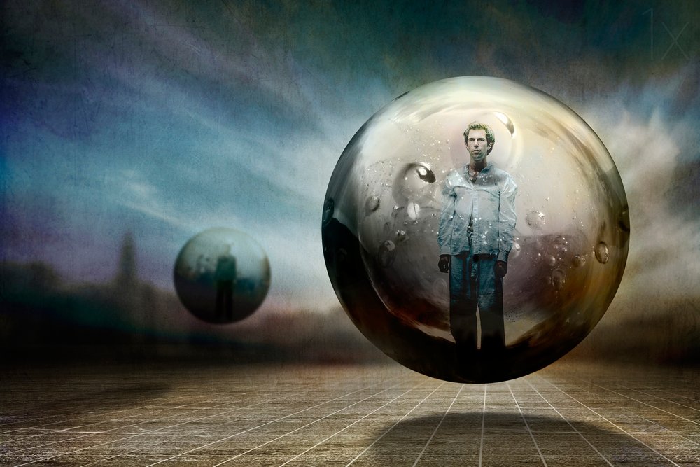 Homem dentro de uma esfera flutuante de Ben Goossens ✝