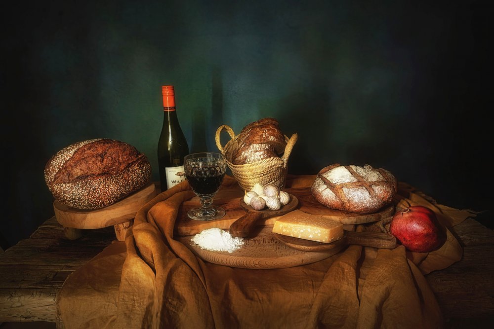 Pão rústico e vinho de Saskia Dingemans