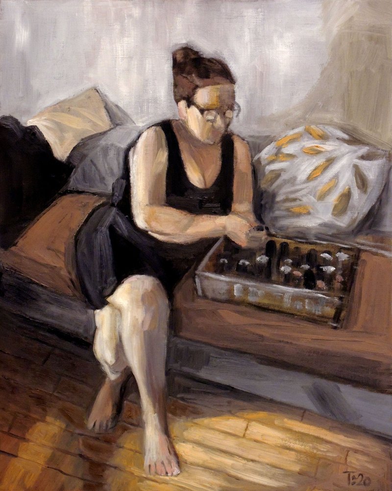 Mulher a arrumar garrafas de Tore Bahnson