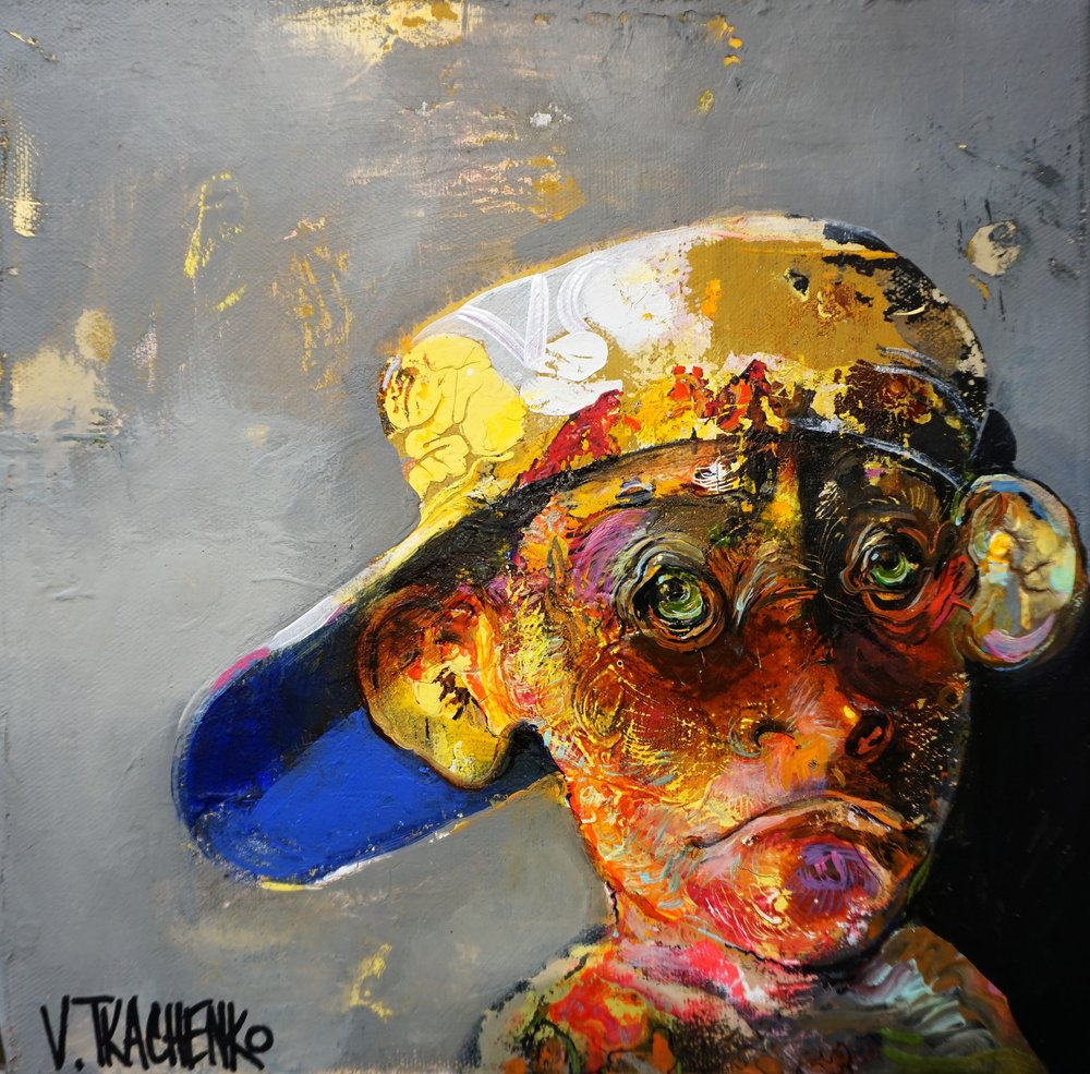 Macaco colorido com boné de Victor Tkachenko