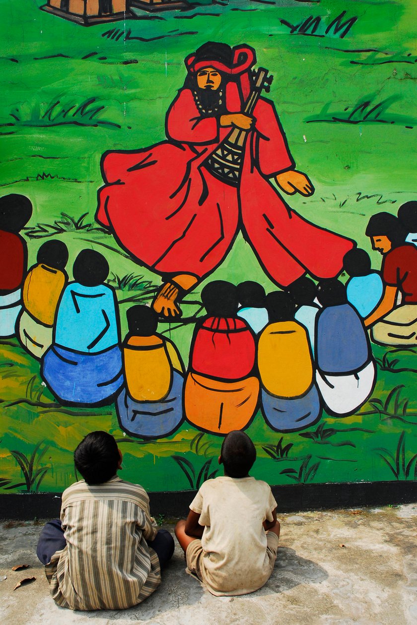 Baul é a música folclórica tradicional em Bangladesh. Há muitos gruops de cantor executaram a música deles - delas em vária aldeia. Esta imagem é uma pintura além de um lugar arqueológico. Alguns chindren são si de Unknown