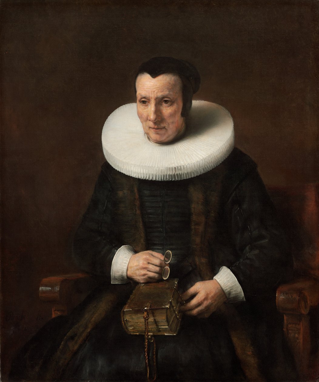Velha senhora com um livro de Rembrandt van Rijn