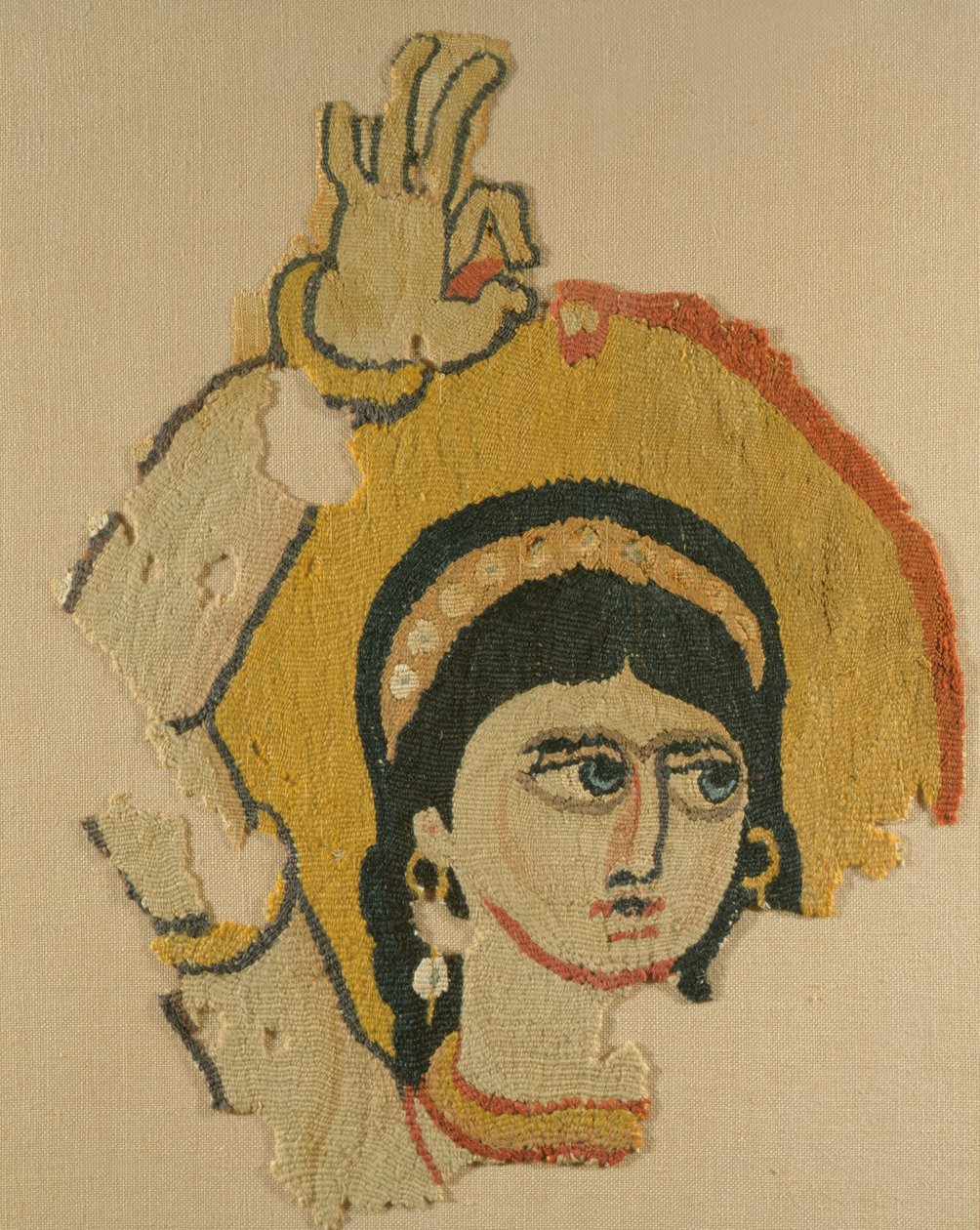 Cabeça de uma dançarina, tapeçaria (linho e lã) de Coptic