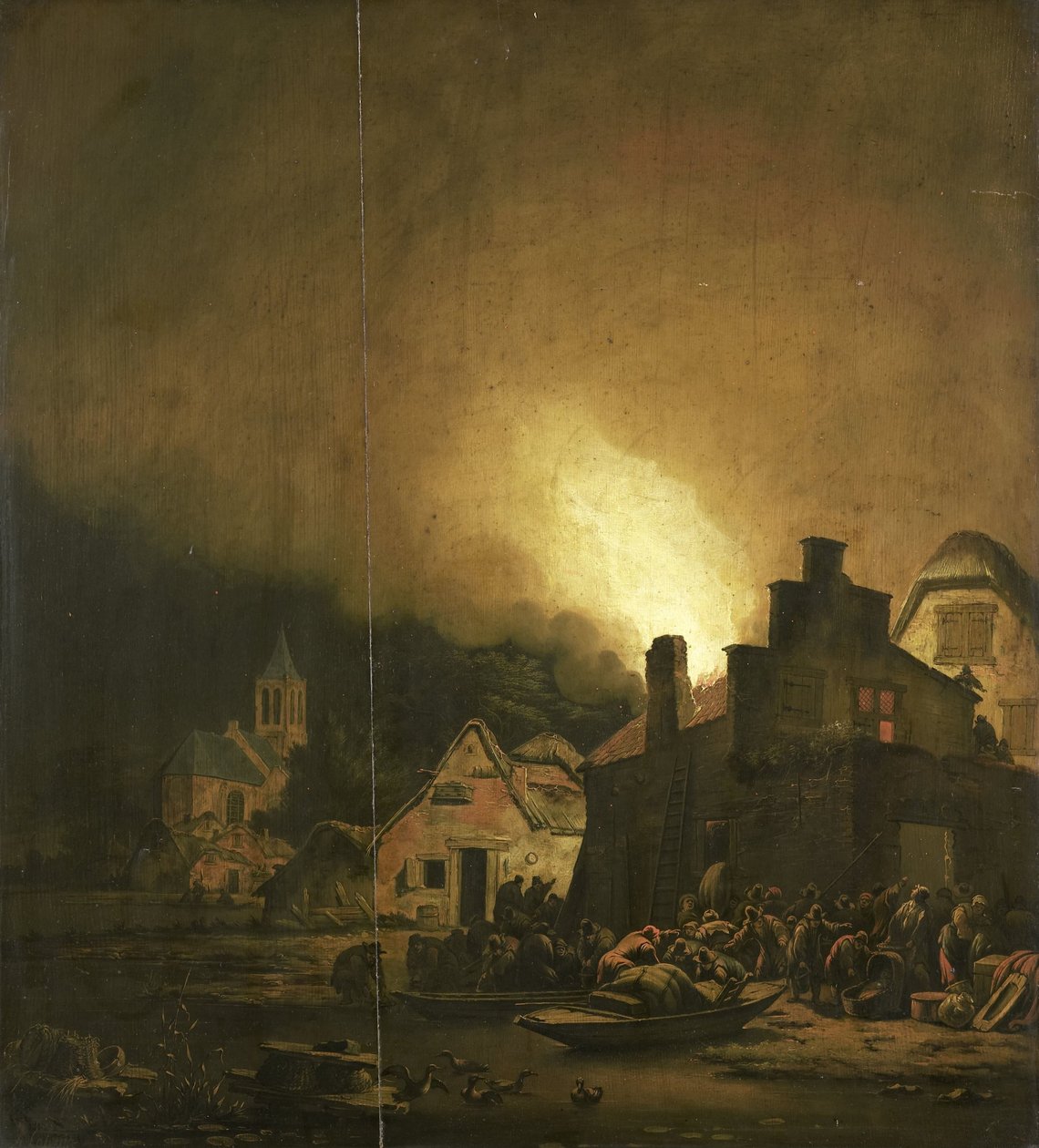 Incêndio nocturno numa aldeia de Adam Colonia