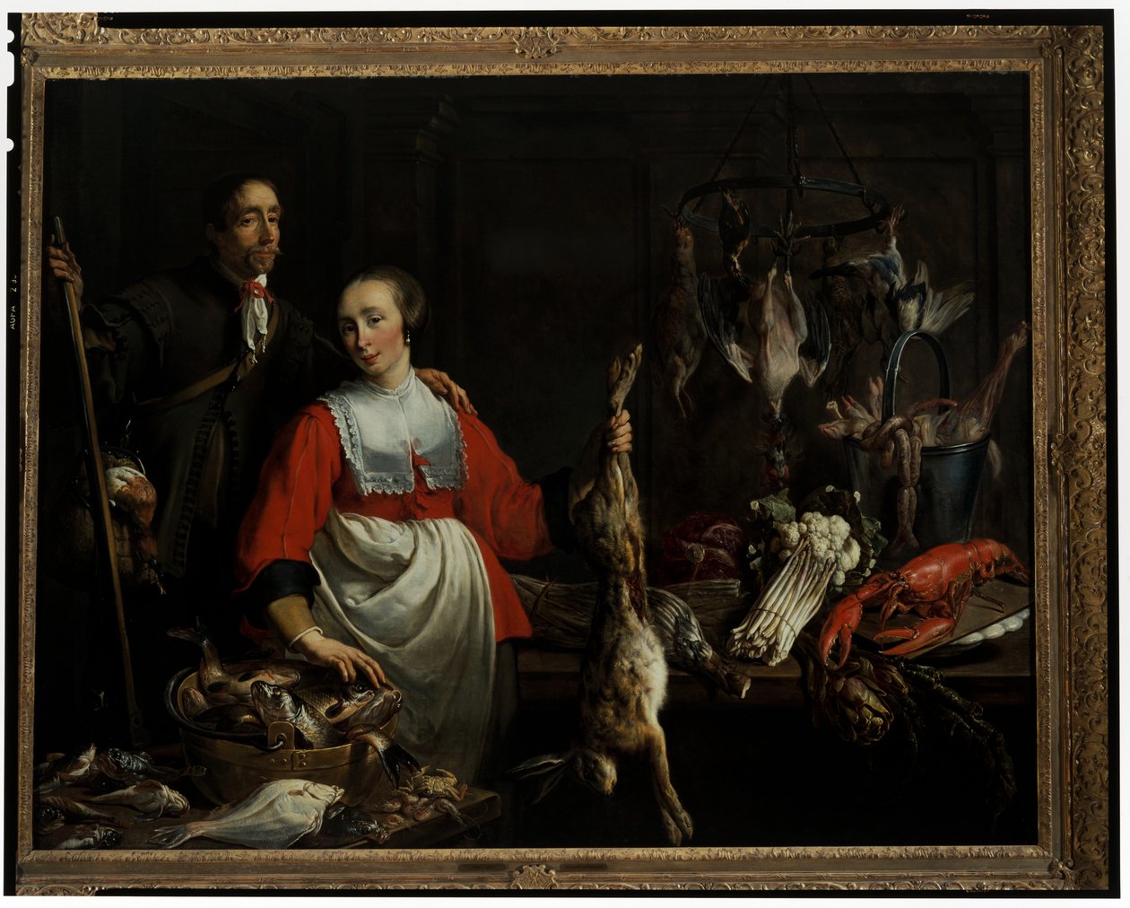 Um guarda-caça com uma pistola de caça e uma criada segurando uma lebre morta numa despensa de Adriaen van Utrecht