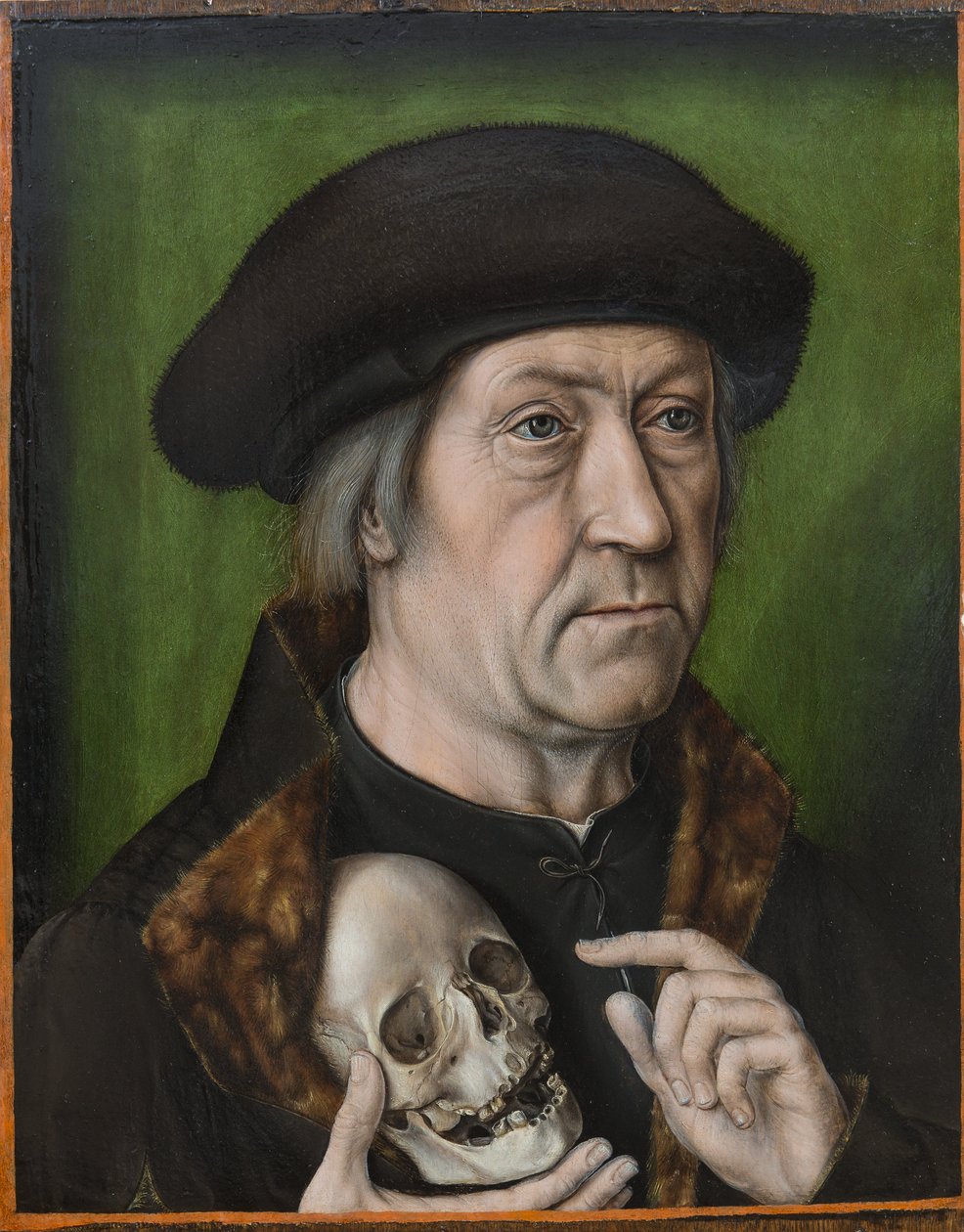 Auto-retrato - Retrato de um homem segurando uma caveira de Aelbrecht Bouts