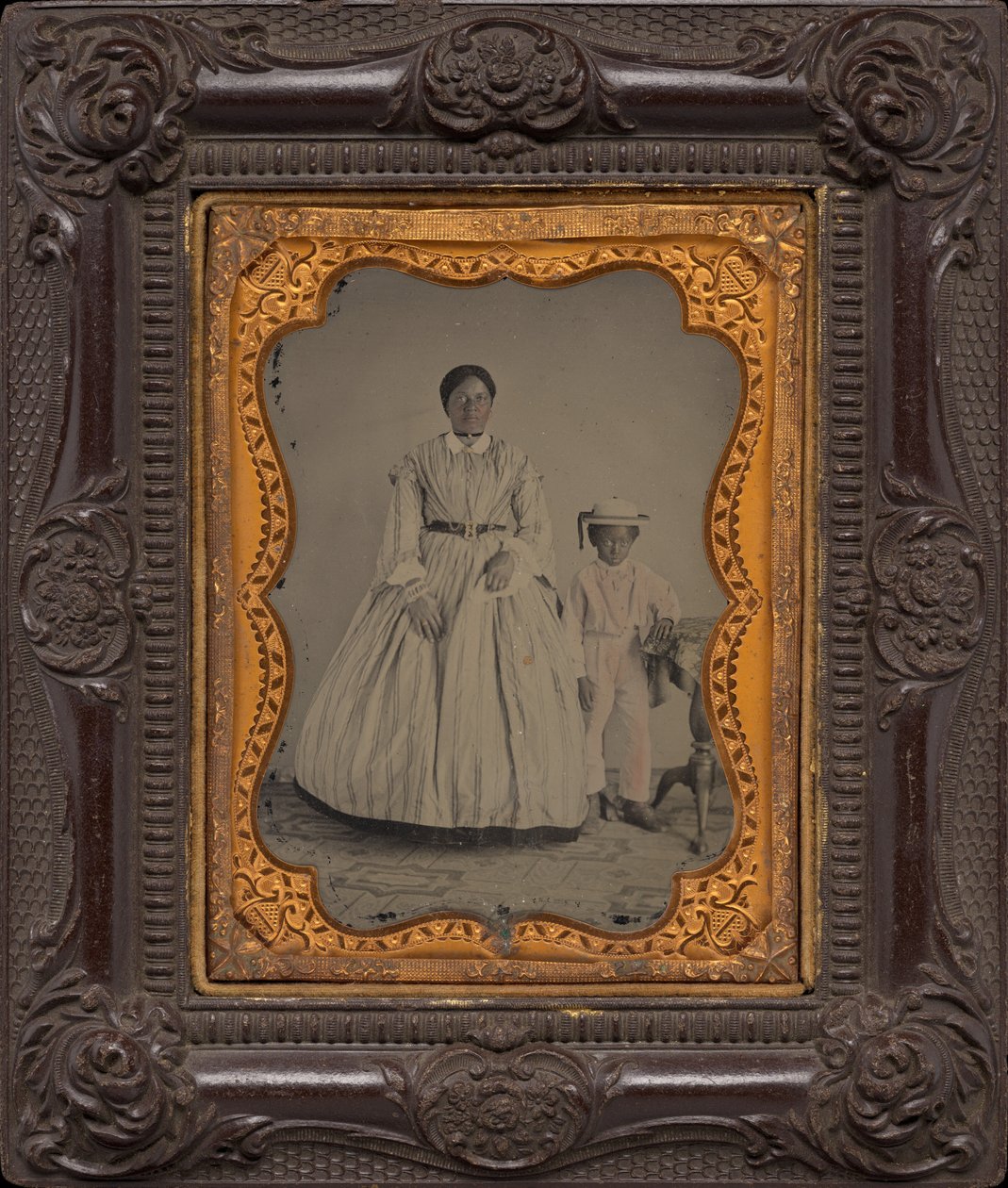 Retrato de uma mulher e de um rapaz,c. 1863 (foto) de American Photographer