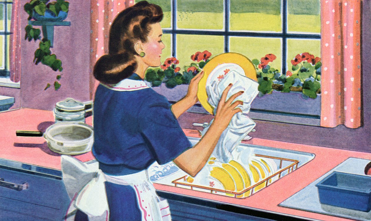 A dona de casa dos anos 40 lava a louça na sua cozinha de sonho de American School