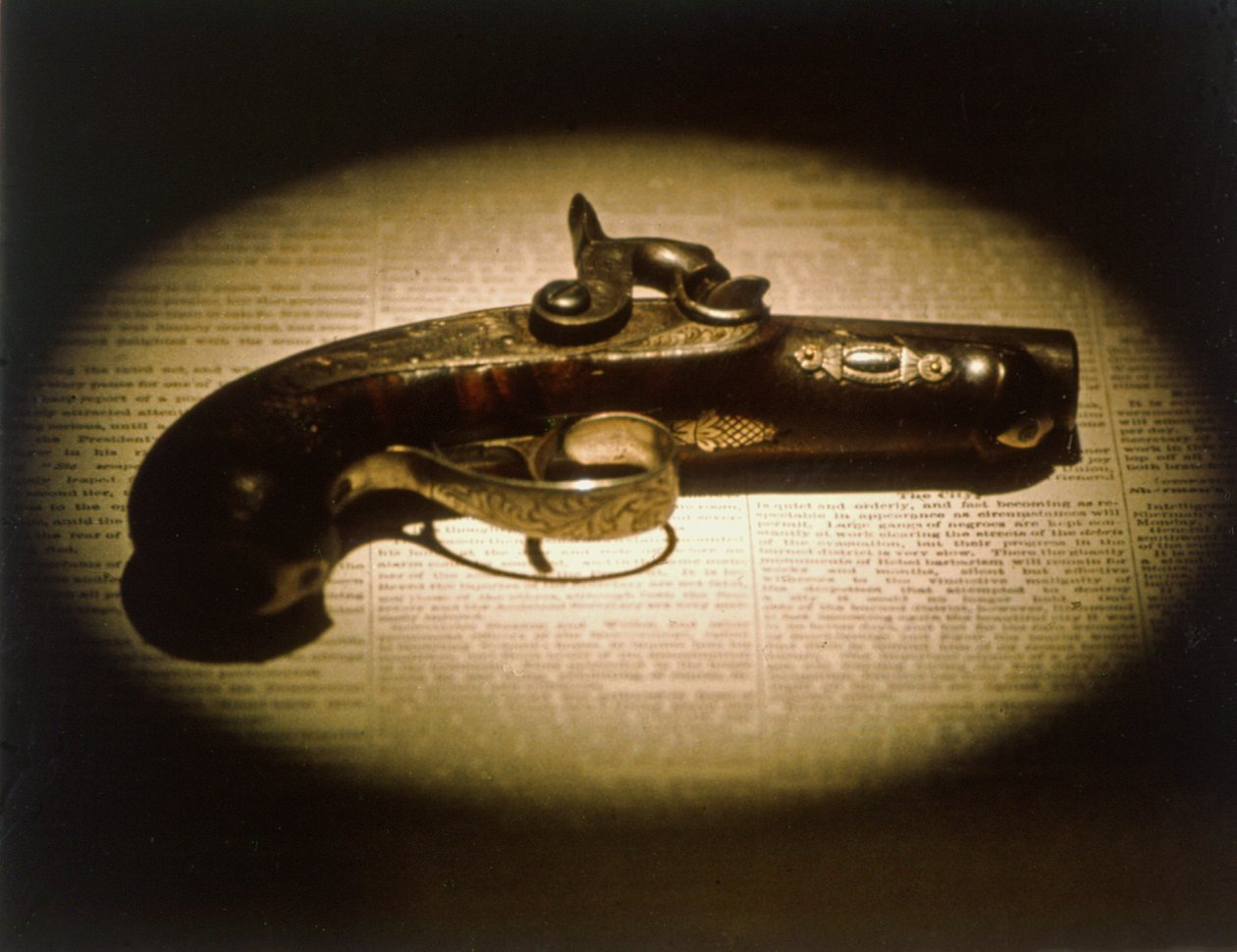 O Deringer calibre .44 usado para assassinar Abraham Lincoln (1809-65) por John Wilkes Booth (1838-65) em 14 de Abril de 1865 (meios mistos) de American School