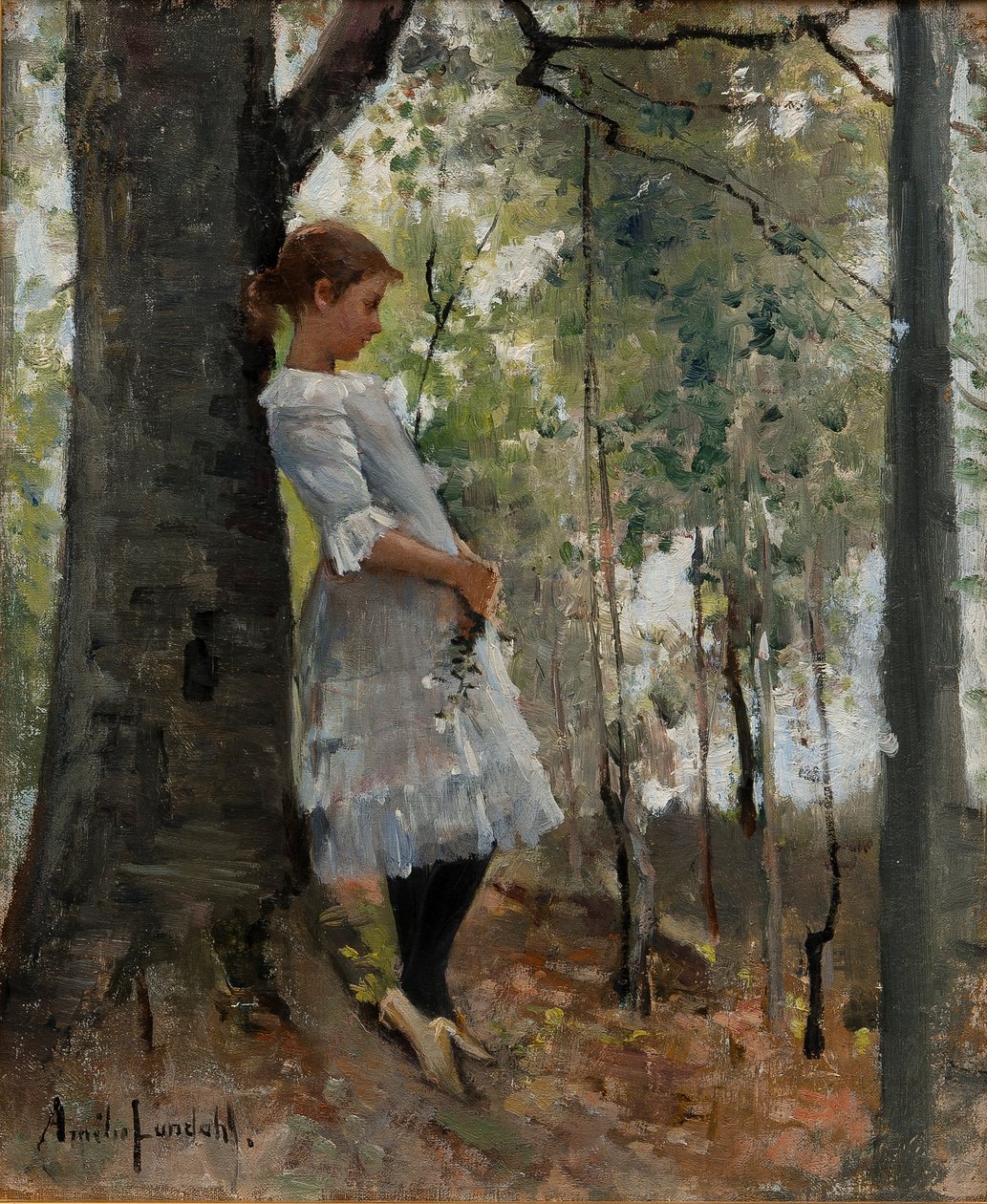 Rapariga numa floresta de folhas de Amélie Lundahl