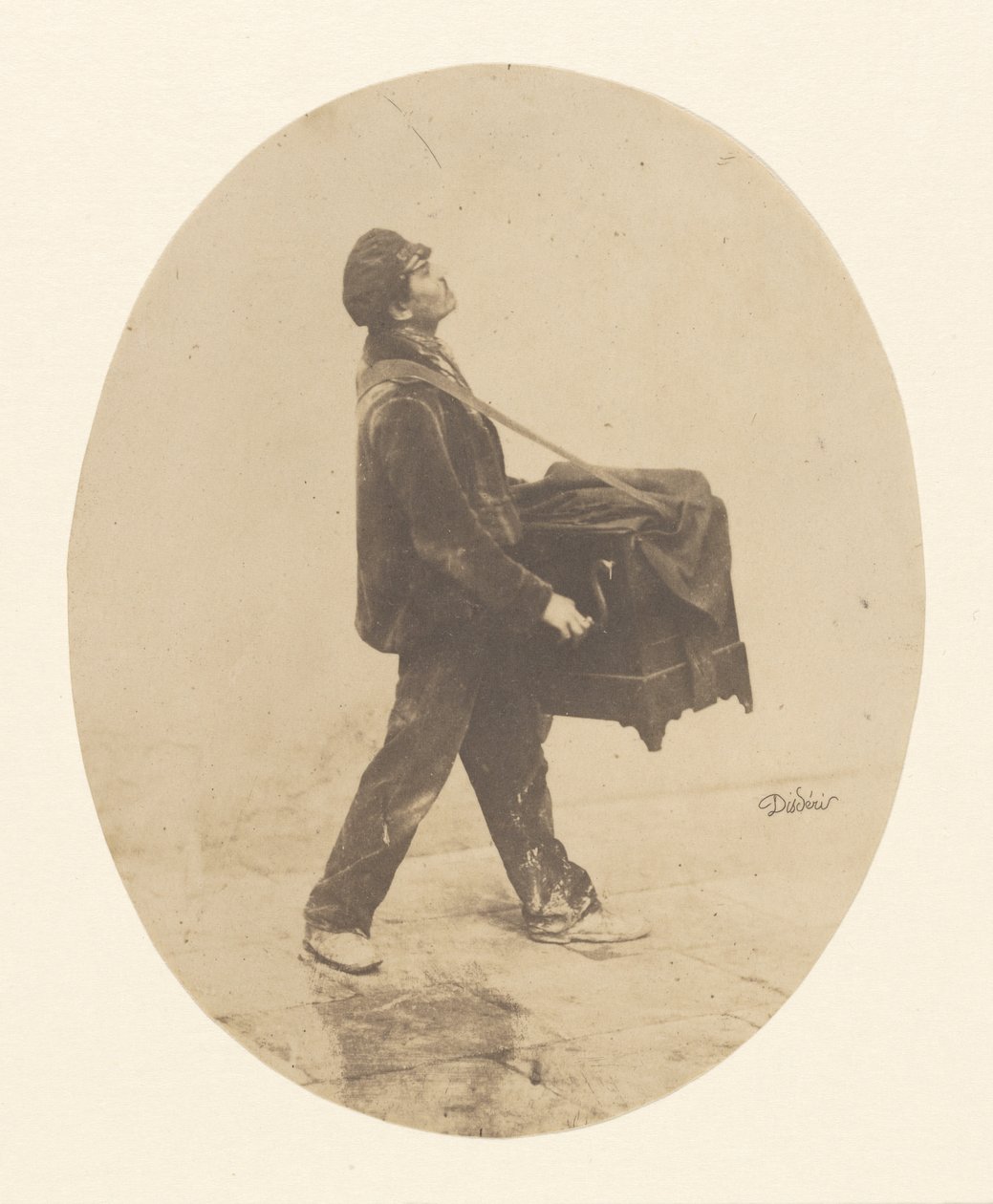 O moedor de órgãos de Andre Adolphe Eugene Disderi