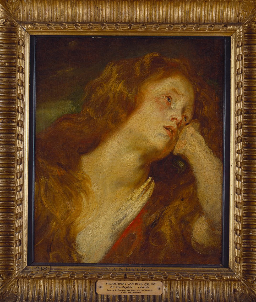 Uma jovem mulher, comprimento do busto, descansando a cabeça na mão de Anthony van Dyck