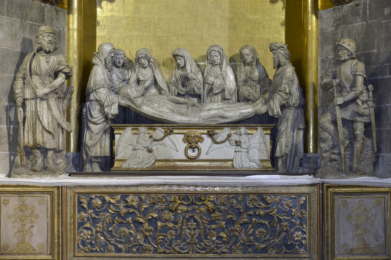 O túmulo: o sudário de Cristo é segurado por Nicomede e José de Arimatéia que segura a cabeça de Jesus, atrás, São João sustenta a Virgem Maria, seguido por três mulheres, a primeira carrega a coroa da coroa e a última é Maria Madalena - Escultura (b de Arnaud de (attr.to) Moles