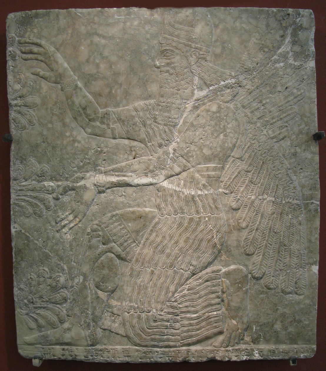 Divindade alada pela árvore sagrada. Alívio do palácio de Ashurnasirpal II em Kalhu, Nimrud, século IX aC de Assyrian
