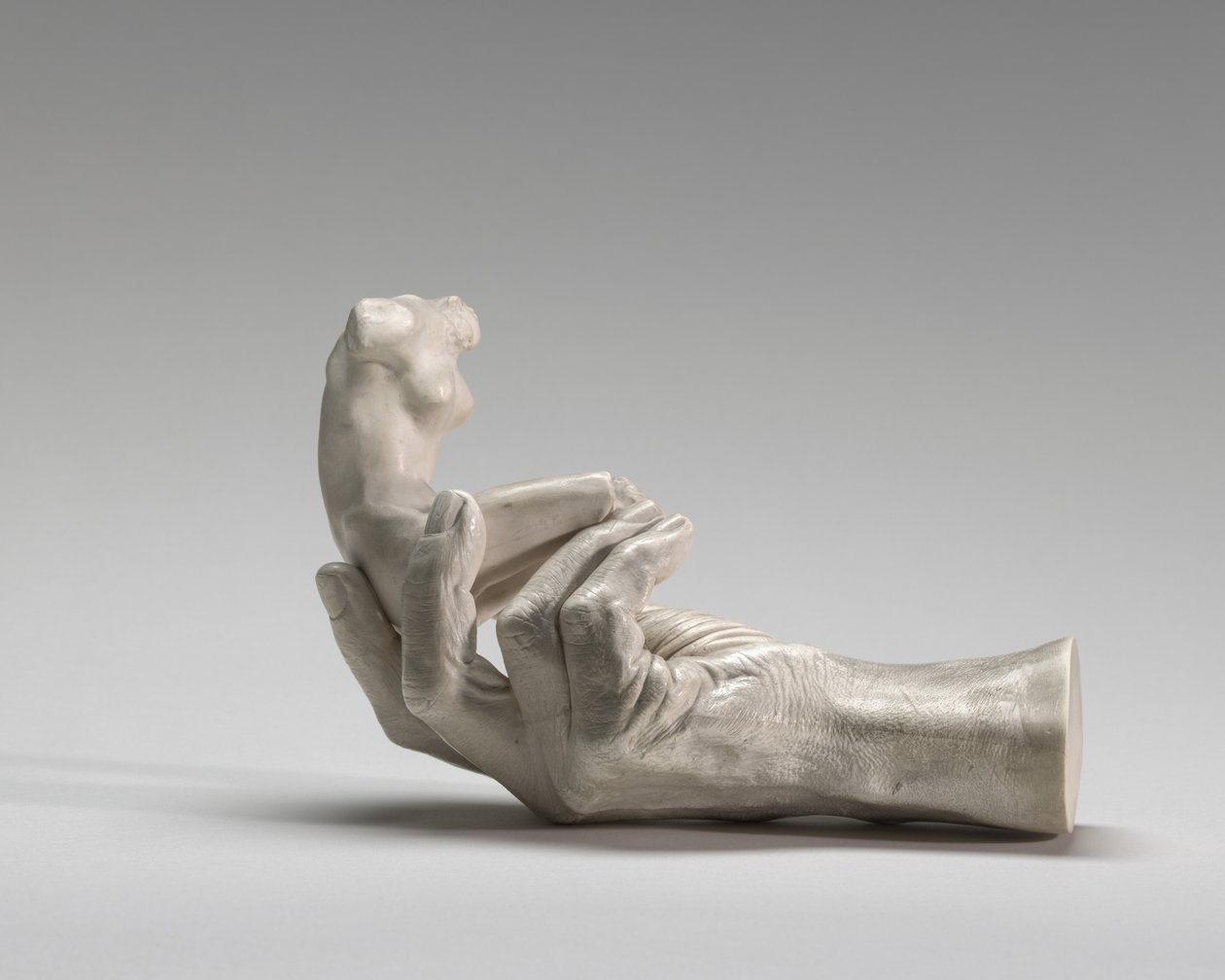 Mão de Rodin com uma figura feminina, 1917. de Auguste Rodin