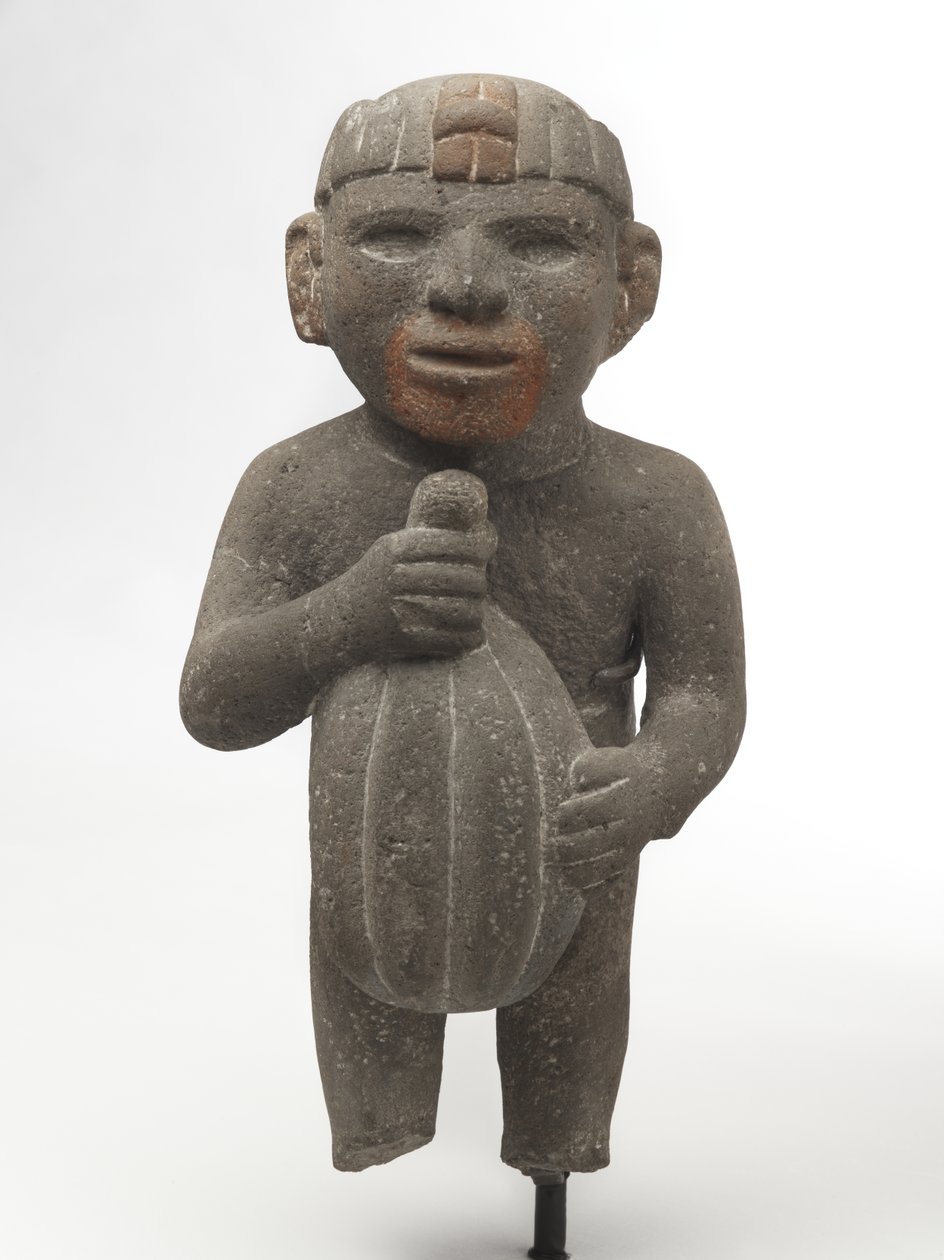 Homem carregando uma vagem de cacau, 1440-1521 (pedra vulcânica com traços de pigmento vermelho) de Aztec