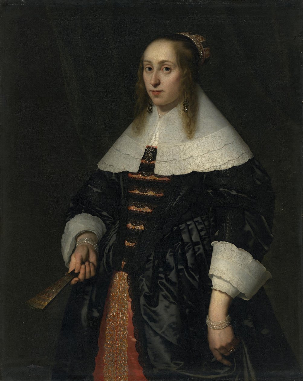 Retrato de uma mulher com veste de cetim preto de Bartholomeus van der Helst