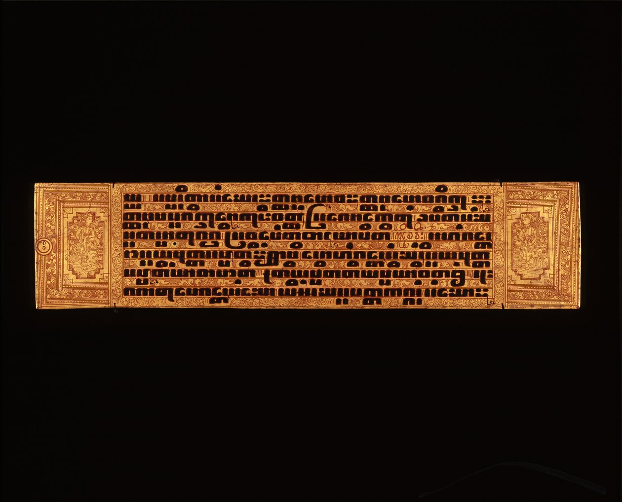 Página de um manuscrito budista birmanês (caneta e tinta e xilogravura sobre papel) de Burmese School
