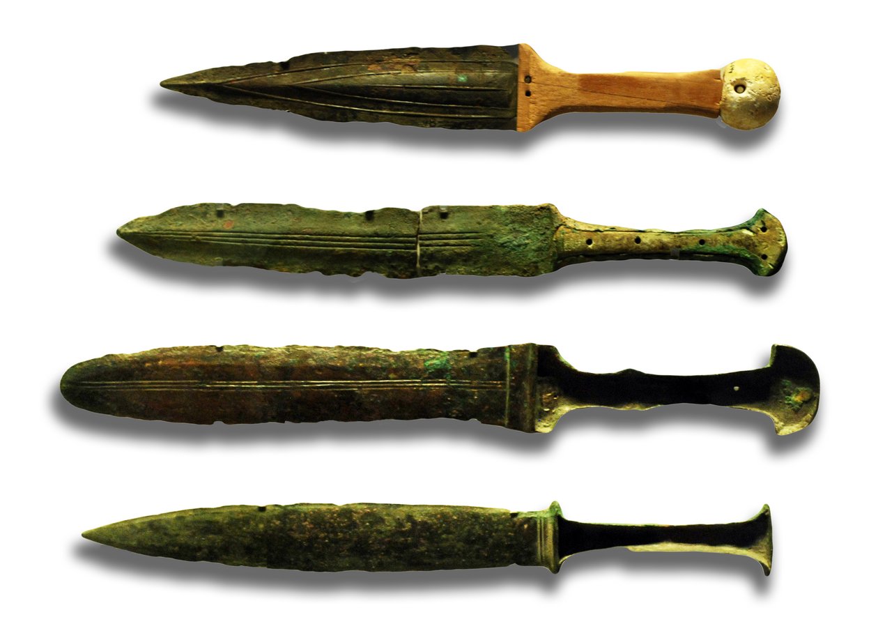 Quatro armas (metal e madeira) de Canaanite