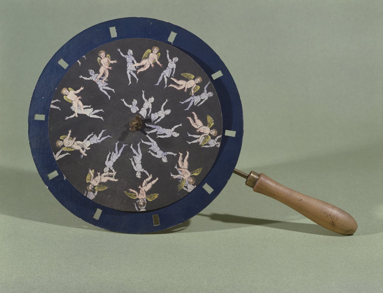 O Phenakisticope com um cartão de design de querubim, 1835 de Charles Chevalier
