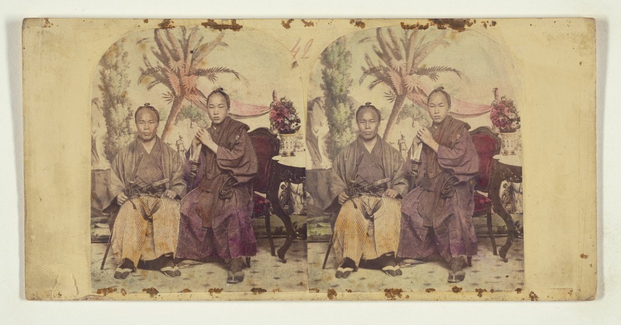 Dois membros da primeira missão diplomática japonesa nos Estados Unidos:  Membro não identificado (à esquerda) e Tateishi Onojirō-Noriyuki, intérprete em formação (à direita) de Charles DeForest Fredricks