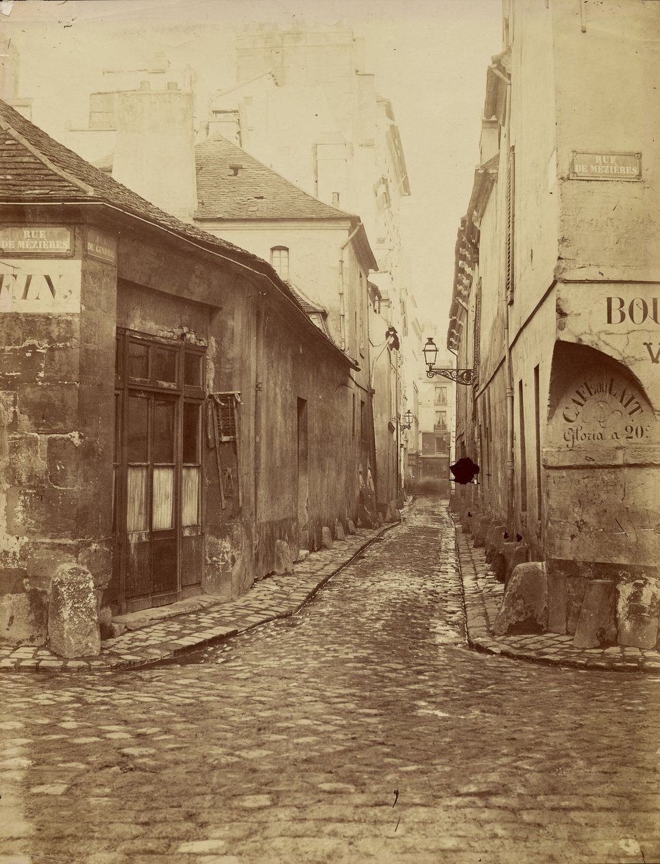 Rue du Gindre (parte da Rue Madame). Vista da Rue de Mézières em direcção à Rue du Vieux-Colombier. de Charles Marville
