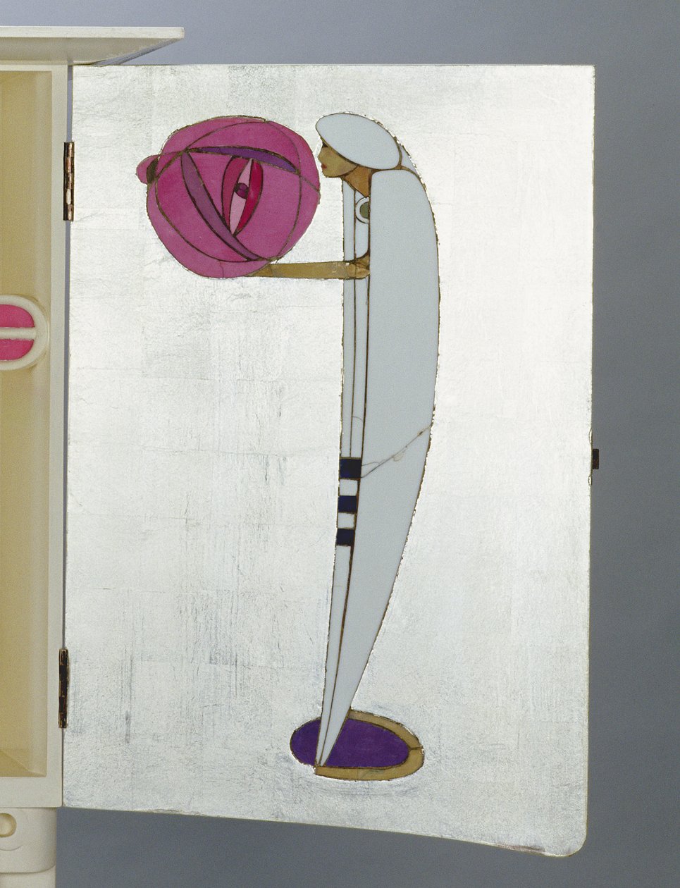 Figura em capa árabe e turbante segurando uma lanterna de Charles Rennie Mackintosh