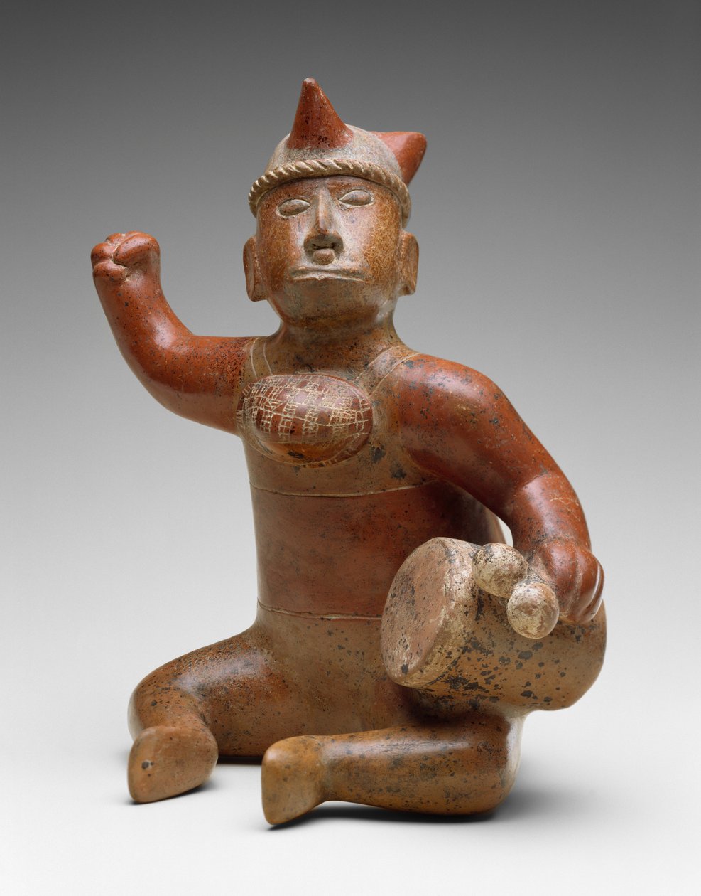 Músico Sentado, México, 100 aC-dC 300 (louça de barro com pintura de deslizamento bichrome) de Colima Culture