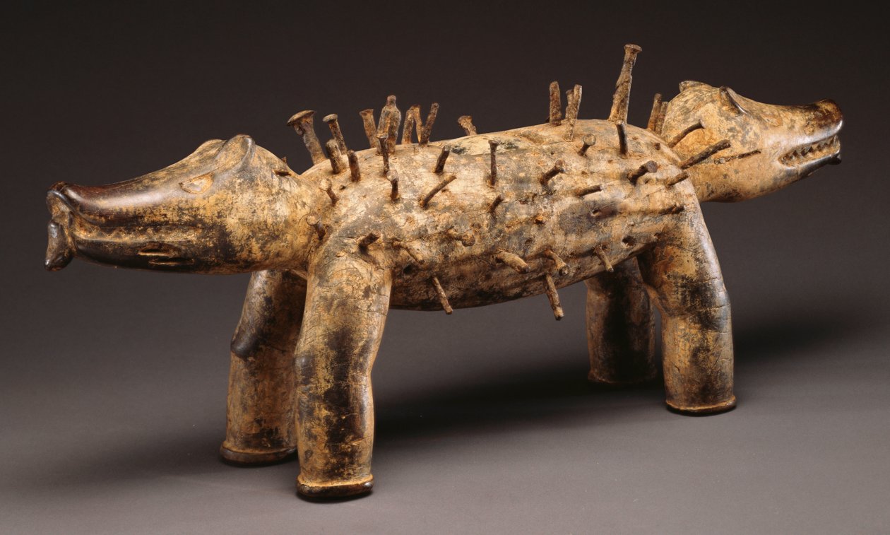 Uma figura de cão de poder do Kongo (madeira, pregos) de Congolese Congolese