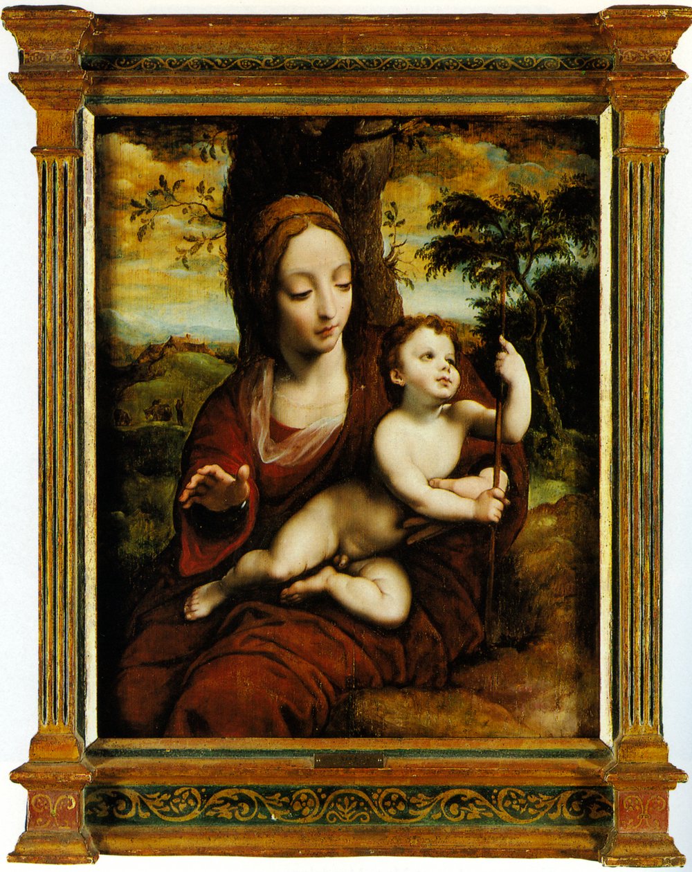 Madonna e criança em uma paisagem de Cornelis van Cleve