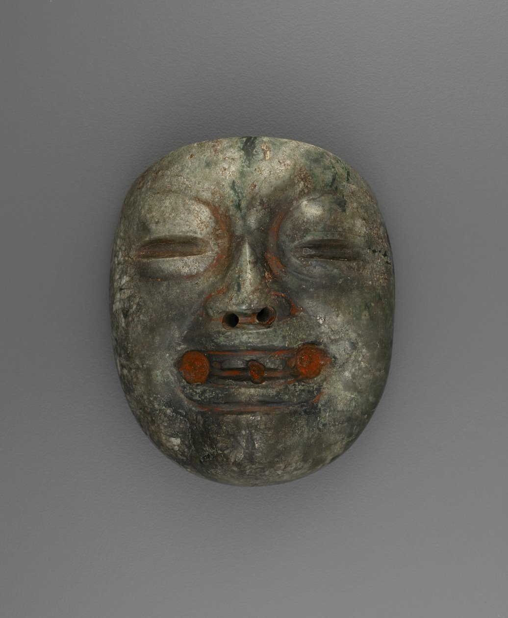 Pingente em forma de máscara de Culture Olmec