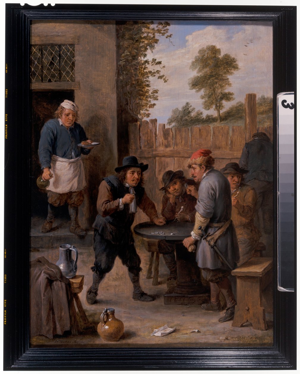 Camponeses a jogar aos dados à porta de uma estalagem de David the Younger Teniers