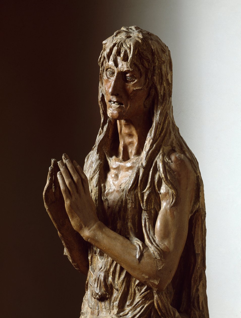 Mary Magdelen. Escultura em madeira policromada de Donatello