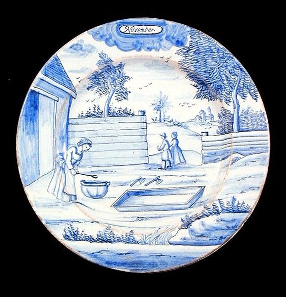 Placa de retentor retratando o mês de Novembro (louça de lata) de Dutch School