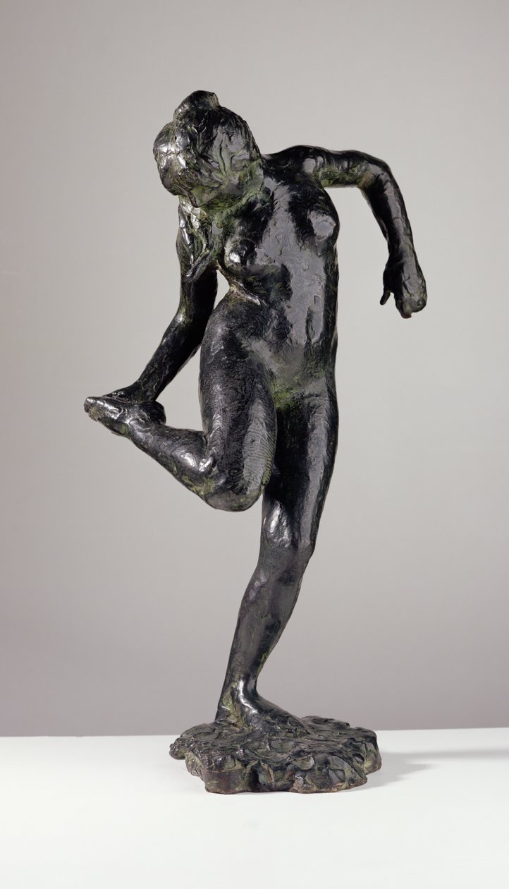 Bailarina a olhar para a sola do pé direito (bronze) de Edgar Degas