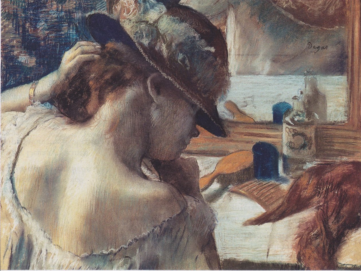 Na frente do espelho de Edgar Degas