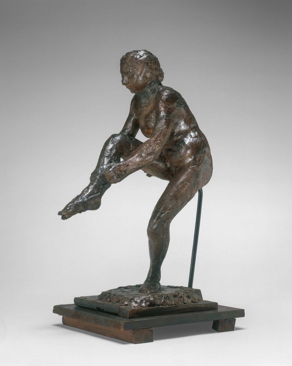 Dançarina colocando sua meia de Edgar Degas