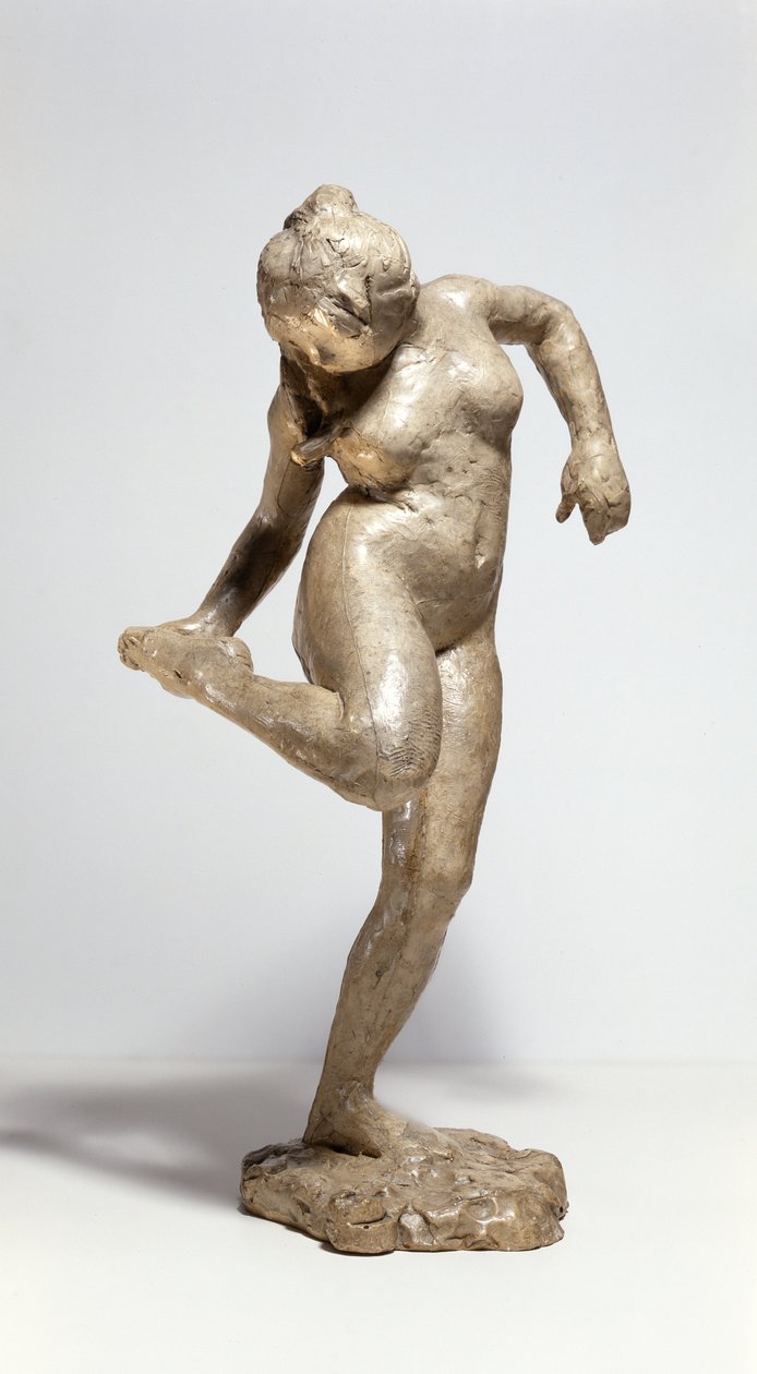 Bailarina a olhar para a sola do pé (gesso) de Edgar Degas