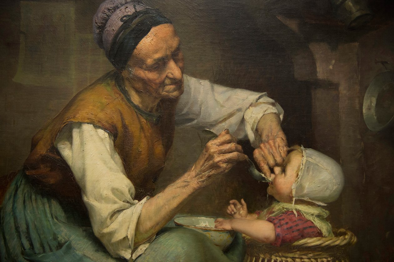Uma mulher idosa alimenta a sua neta, segurada num carrinho de vime, por Edouard Jerome Paupion de Edouard Jerome Paupion