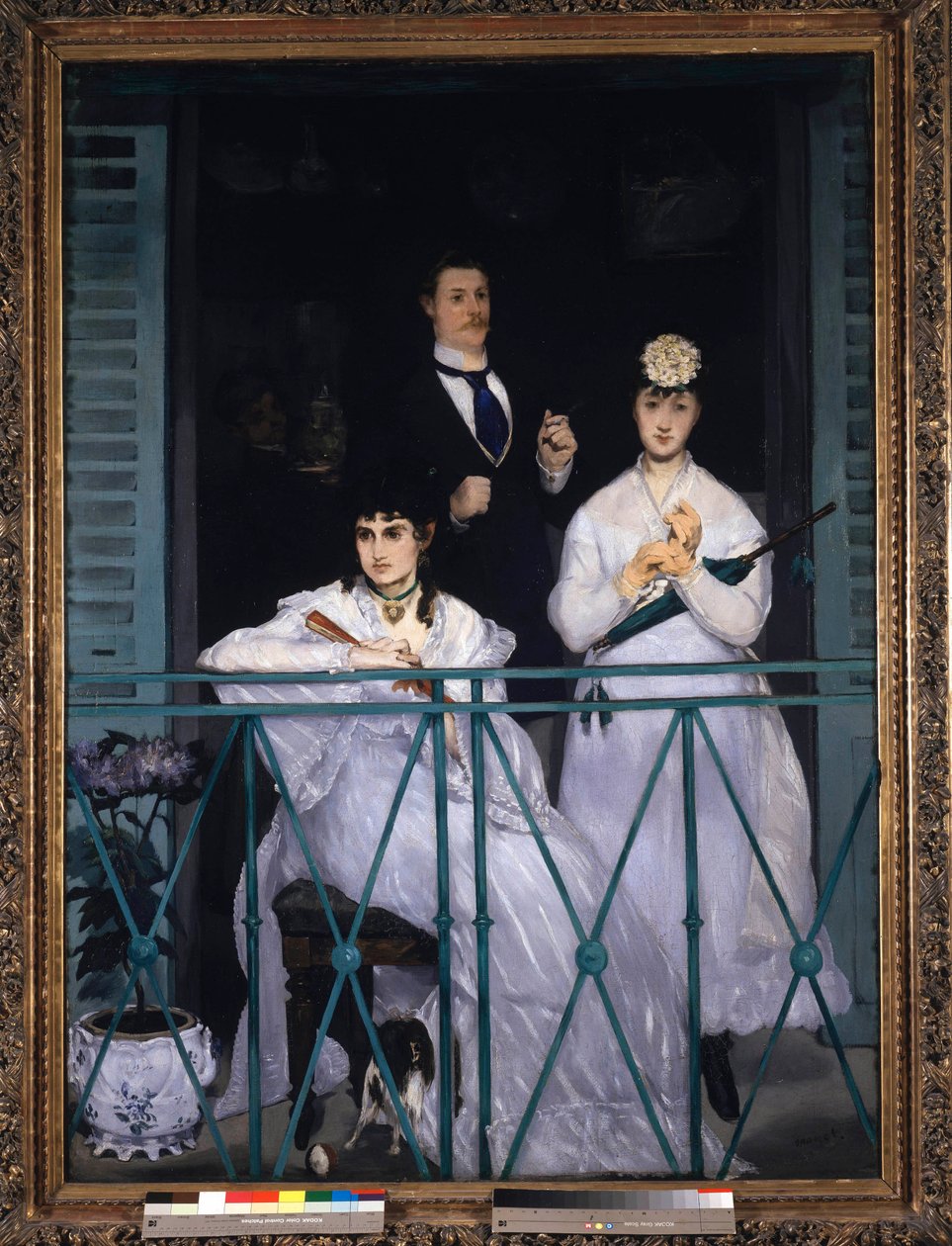 Varanda Duas jovens mulheres segurando uma ventoinha e um guarda-chuva e um homem de gravata. Retrato de Berthe Morisot (1841-1895), pintor francês, Fanny Claus (1846-1877), violinista, Antoine Guillemet (1841-1918), paisagista e fundo Leon Leenhoff. Pintu de Édouard Manet