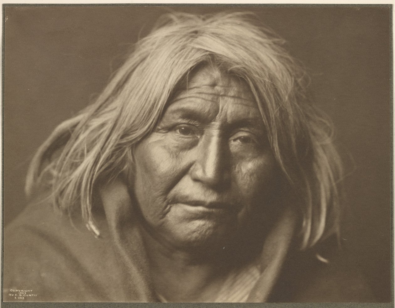 [Um apache] de Edward S. Curtis