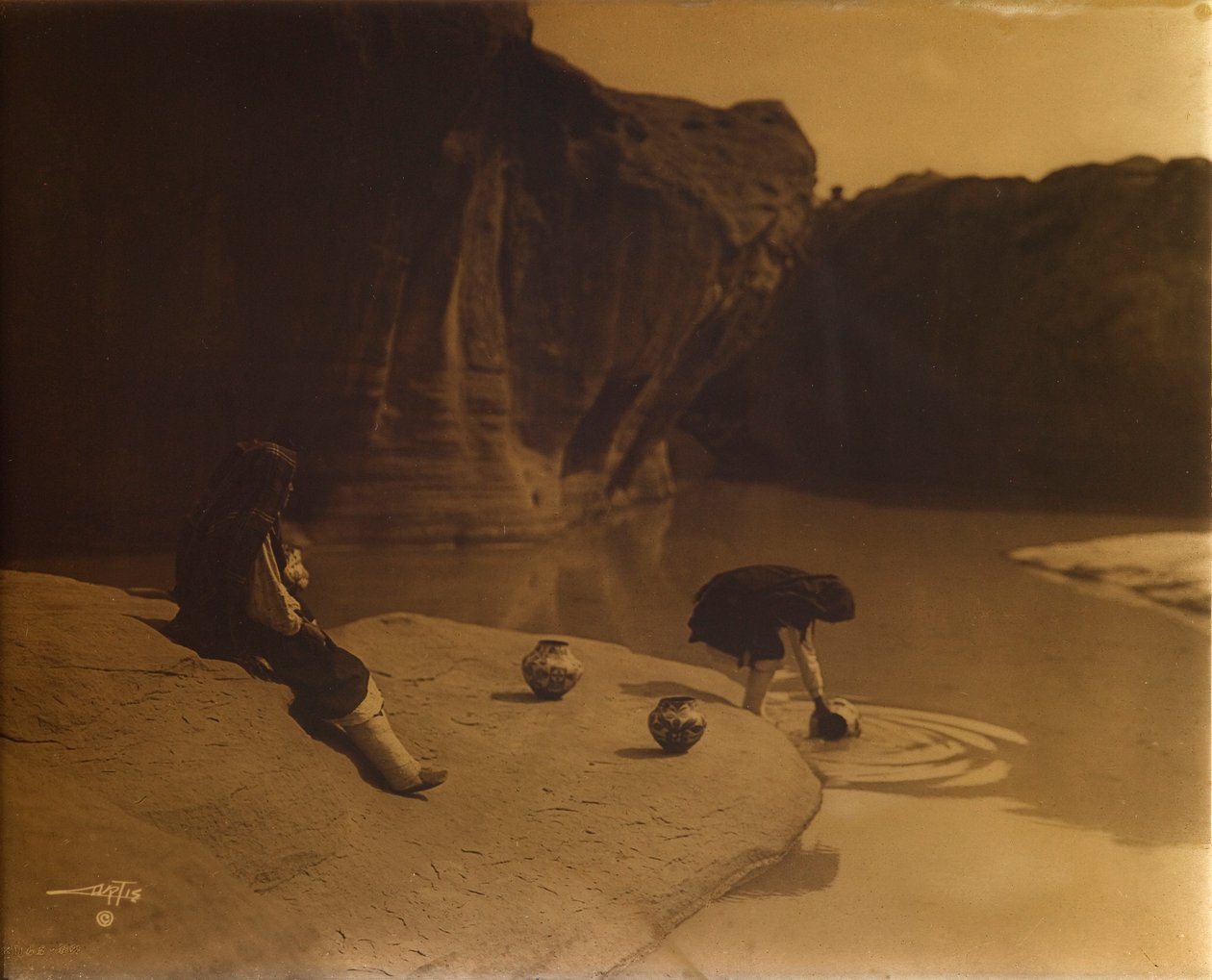 No Velho Poço de Acoma de Edward S. Curtis