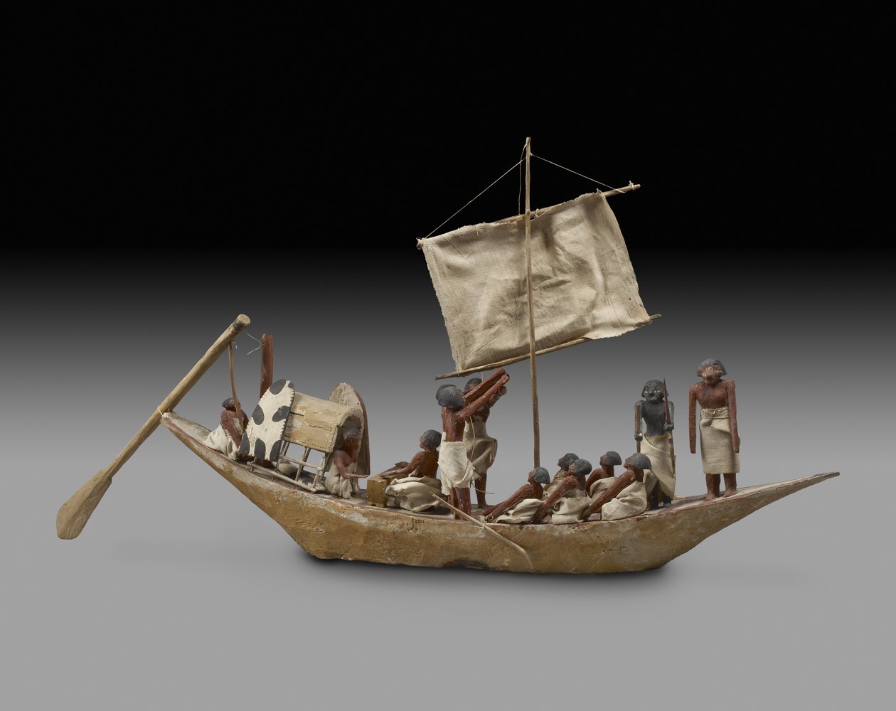 Barco de guerra modelo com vela, remos e 14 figuras, dinastia 9-11 (c.2125-1940) (madeira, gesso, têxtil, pintura, linho e corda) de Egyptian
