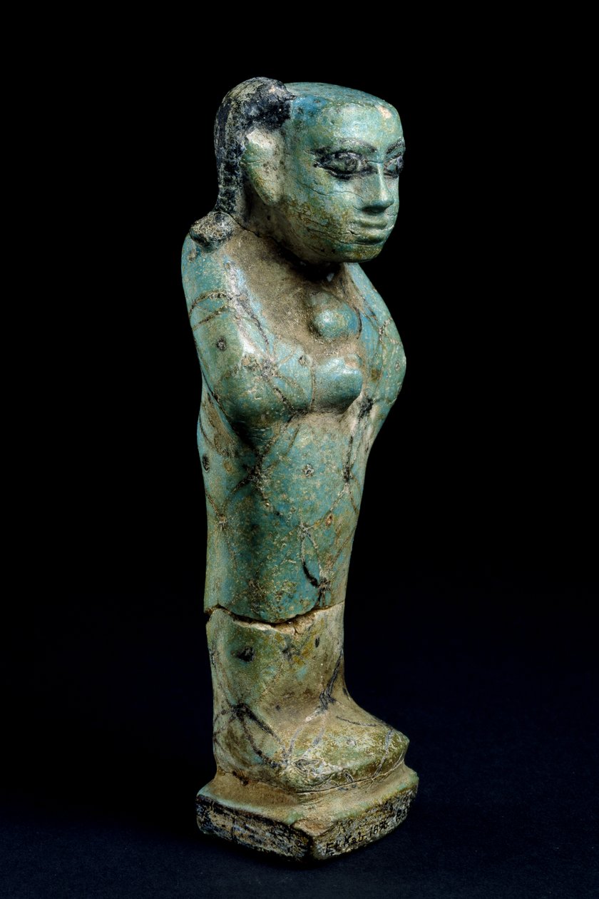 Estatueta de uma criança em uma faiança de mortalha de Egyptian 12th Dynasty