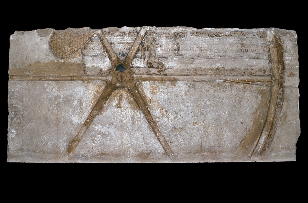 Bloco de pedra calcária esculpida e pintada com representação de uma roda de carruagem, 1353-35 aC (calcário) de Egyptian 18th Dynasty